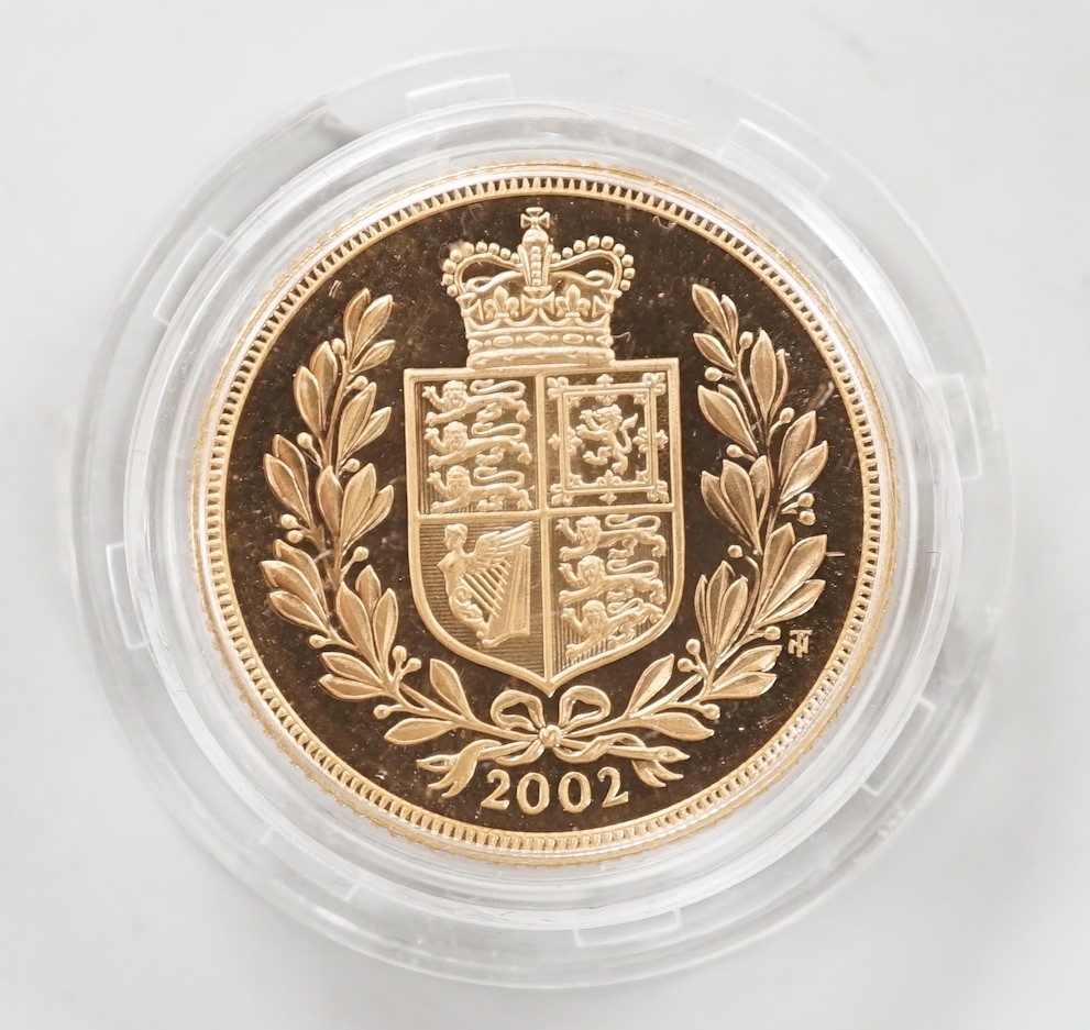 An Elizabeth II 2002 gold sovereign, in case.